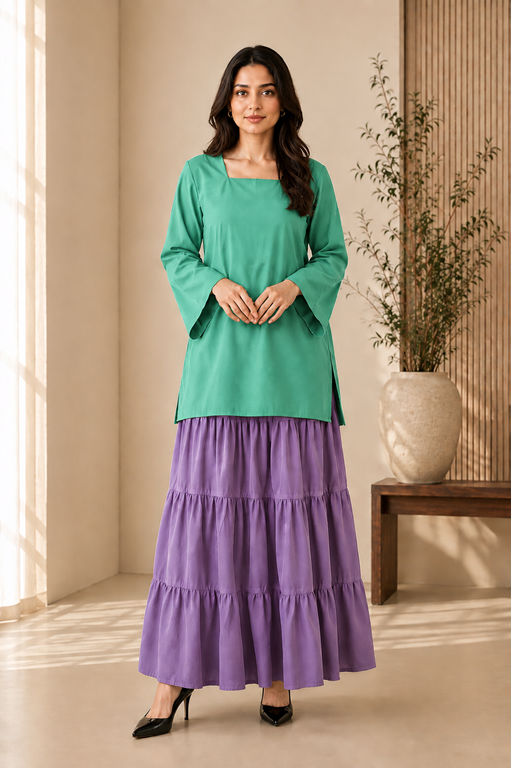 two-piece outfit consisting of a green long-sleeve top and a purple tiered maxi skirt